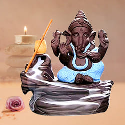 Marvelous Bal Ganesha Smoke Fountain Polyresin Showpiece to Kolkata