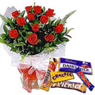 Dozen Red Roses with Cadburys Chocolate Celebration BoxAssorted cadburys chocolates to Nipani