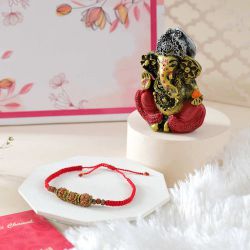 Sacred Bond Rakhi Set with Ganpati to Rakhi-to-australia.asp