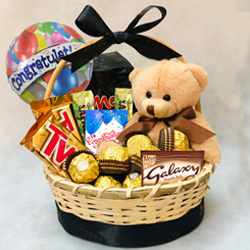 Delectable Gift Basket of Chocolates N Teddy to India