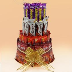 Magical 4 Layer Tower Arrangement of Assorted Chocolates to Muvattupuzha