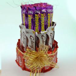 Tempting 3 Layer Tower Arrangement of Mixed Chocolates to Alappuzha