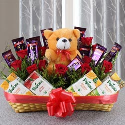 Wonderful Basket of Chocolates with Fruit Juice N Teddy to Muvattupuzha