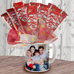 Delectable Bouquet of Kitkat in Personalized Coffee Mug to Muvattupuzha