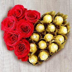 Wonderful Heart Shaped Arrangement of Ferrero Rocher with Roses to Punalur