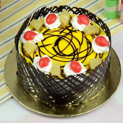 Enjoyable Eggless Pineapple Cake in Round Shape to Cooch Behar