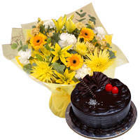 Appetizing Chocolaty Truffle Cake with Mixed Flowers Bunch to Ambattur
