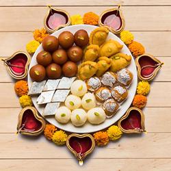 Special Tasty Assorted Diwali Sweets from Bhikaram with Diya to Irinjalakuda