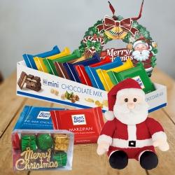 Exclusive Ritter Sport Chocos with Santa Claus Soft Toy N Wreath to Muvattupuzha