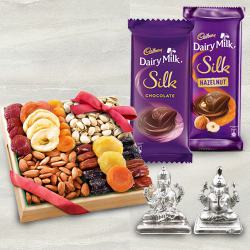 Lavish Gift of Cadbury Chocolates and Dry Fruits with Idol to Kanyakumari