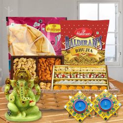 Wonderful Diwali Sweet n Snacks Gift Basket with Handmade Dot Mandala Art Diya to Uthagamandalam