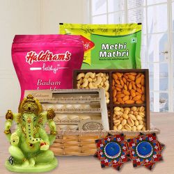 Unique Diwali Gift Hamper of Dry Fruits, Haldriam Sweets, Ganesh Idol  N  Dot Mandala Art Diya to Kanjikode