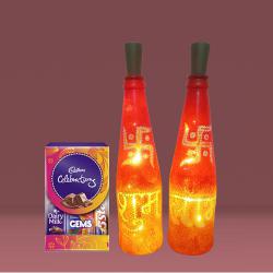 Amazing Diwali Gift of Subh Labh LED Bottle Lamp Pair n Cadbury Celebration to Nipani