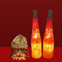 Ideal Gift of Subh Labh LED Bottle Lamp n Almonds Potli to Tirur