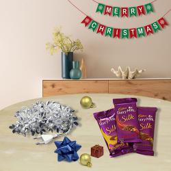 Excellent String Lights n Merry Christmas Banner with Cadbury Chocolates to Kanjikode
