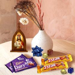 Stunning Xmas Gift of Holy Statue, Pendant n Chocolates to Kanjikode