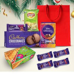 Appealing Christmas Chocolate N Snacks in a Bag to Hariyana