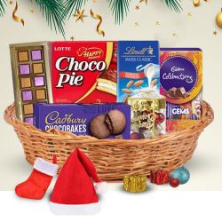 Assorted Chocolates n Christmas Accessories Basket to Muvattupuzha