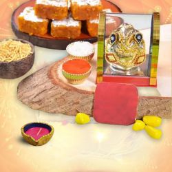 Ganesha, Sweets And Diya Hamper to Rajamundri