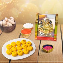 Ganesha, Sweets, Nuts And Diya Delights to Alappuzha