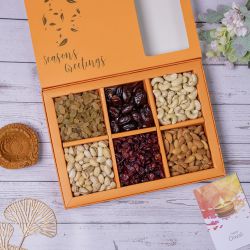 Assorted Nuts and Diya Hamper to Muvattupuzha