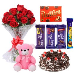 Dutch Roses Bouquet with Cake, Teddy N Assorted Cadbury Chocolates  to Irinjalakuda