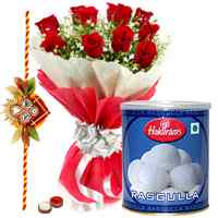 1 Kg. Rasgulla and 12 Red Roses with Free Rakhi, Roli Tika, Chawal to Cooch Behar