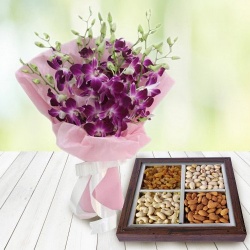 Orchids Bouquet and 500 gms Dry Fruits to Tirur
