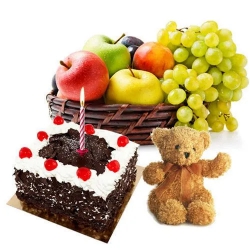 Exclusive Teddy with Candles, Fresh Fruits Basket and Black Forest Cake to Nipani
