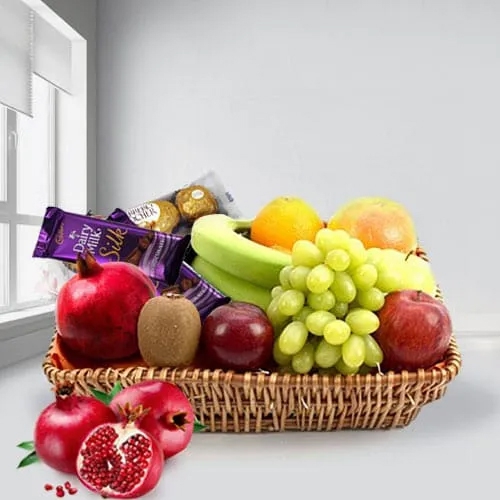 Tasty Fruits Basket with Assorted Chocolates to Tirur