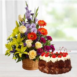 Stunning Seasonal Flowers with Black Forest Cake to Muvattupuzha