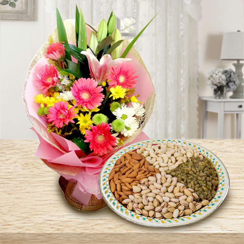 Charming Seasonal Flowers with healthy Dry Fruits to Tirur