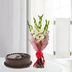 Amusing Gladiolus Bouquet with Chocolate Cake to Irinjalakuda