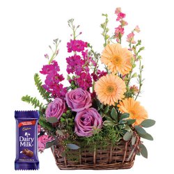 Splendid colorful Flowers along with luscious Cadburys Chocolate to Kanjikode