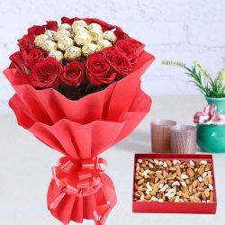 Irresistible Dry Fruits in Box with Bouquet of Red Roses n Ferrero Rocher Chocolates to Irinjalakuda