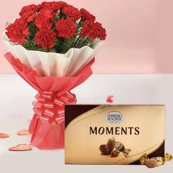 Charismatic Red Carnations Bouquet with Ferrero Rocher Chocolate to Uthagamandalam
