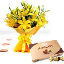 Classic Bouquet of Yellow Lilies with Ferrero Rocher Moments to Irinjalakuda