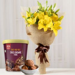 Elegant Yellow Lily Bouquet with Kwality Walls Choco Brownie Fudge Ice Cream to Muvattupuzha