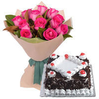 Captivating Pink Roses Bunch with Black Forest Cake to Irinjalakuda