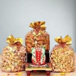 Divine Marble Ganesha with Assorted Dry Fruits to Rajamundri
