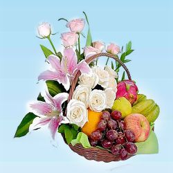 Mouth Watering Fresh Fruits Basket Decorated with Lily and Roses to Rajamundri