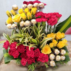 Designer Arrangement of Assorted Flowers with Ferrero Rocher Chocolate to Kanjikode