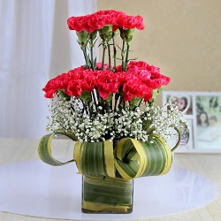 Classy Double Layered Pink Carnation Arrangement in a Vase to Irinjalakuda