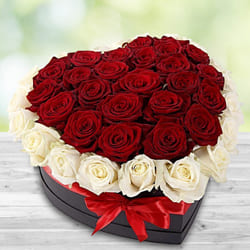 Fabulous Heart Shaped Box of Red and White Roses to Muvattupuzha