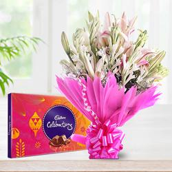 Amusing Lilies N Gladiolus Bouquet with Cadbury Celebration Pack to Muvattupuzha