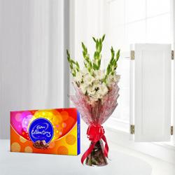 Captivating Gladiolus Bouquet with Cadbury Celebration Pack to Punalur