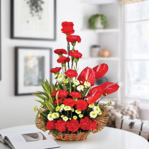 Lovely Arrangement of Red Carnations n Anthurium to Tirur