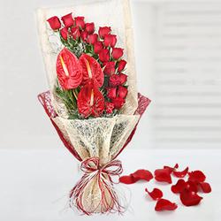 Exotic Bouquet of Red Roses n Anthurium to Muvattupuzha