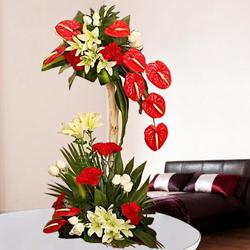 Magnificent Tall Arrangement of Red N White Flowers to Cooch Behar