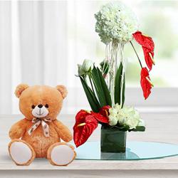 Artistic Flowers Display in Glass Vase with Cute Teddy to Marmagao